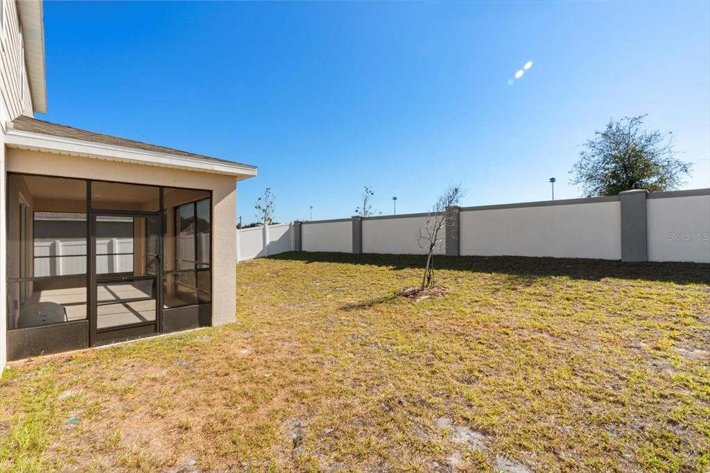 3657 Sublett Loop Tavares, FL 32778 - Photo 34 of 39 a view of a backyard