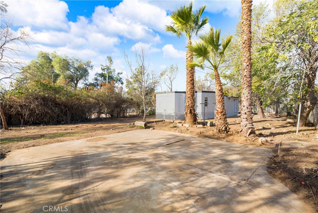 9106 Kennedy Street Riverside, CA 92509 - Photo 18 of 24 a view of a yard with a house