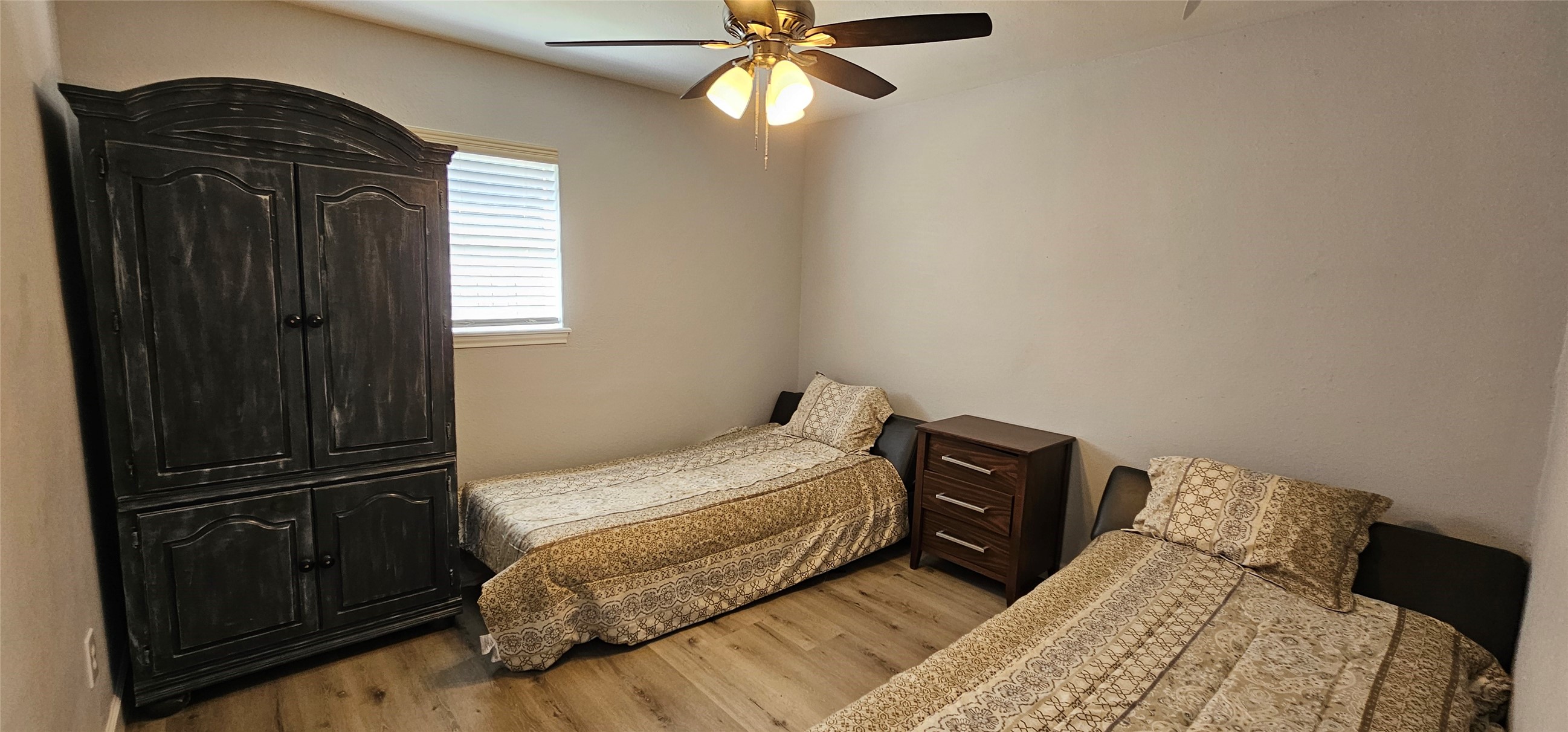 26311 Maplewood Drive Spring, TX 77386 - Photo 13 of 23 a bedroom with a bed and a closet