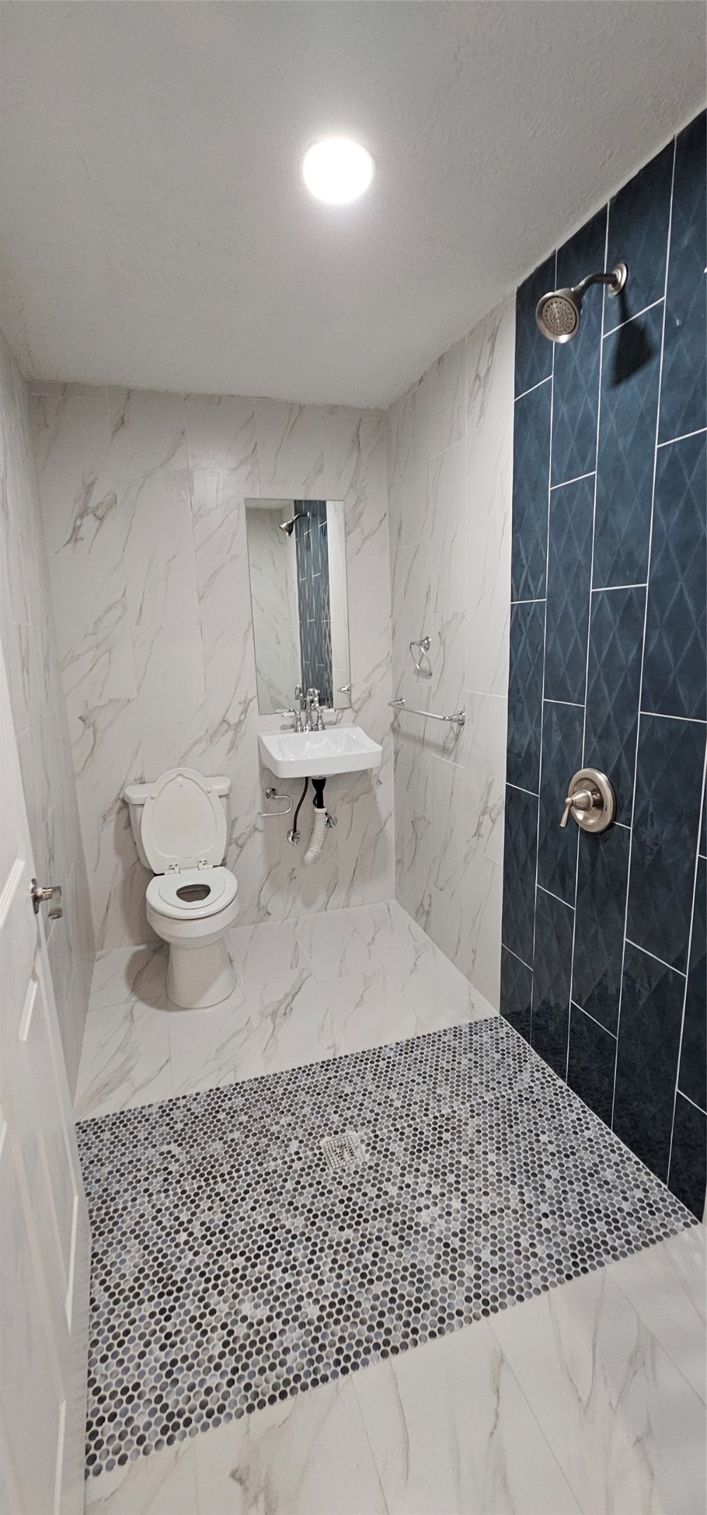 26311 Maplewood Drive Spring, TX 77386 - Photo 16 of 23 a bathroom with a sink toilet and shower