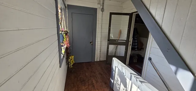 a view of hallway with stairs