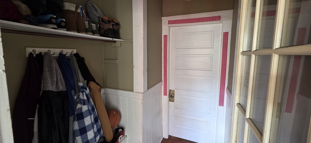 72 Seymour Street, Unit 2 Worcester, MA 01610 - Photo 15 of 18 a view of walk in closet with clothes and shoes