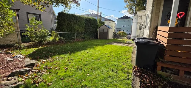 a backyard of a house with lots of green space