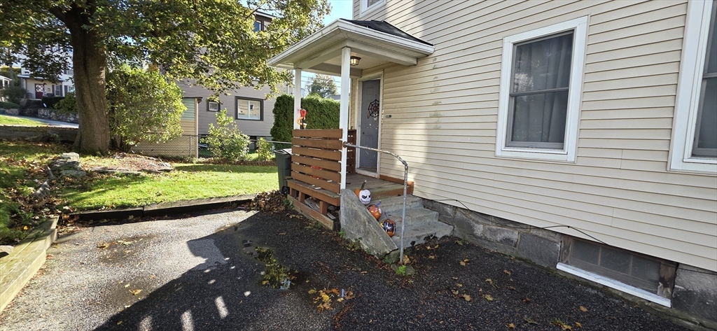 72 Seymour Street, Unit 2 Worcester, MA 01610 - Photo 18 of 18 a front view of a house with a yard