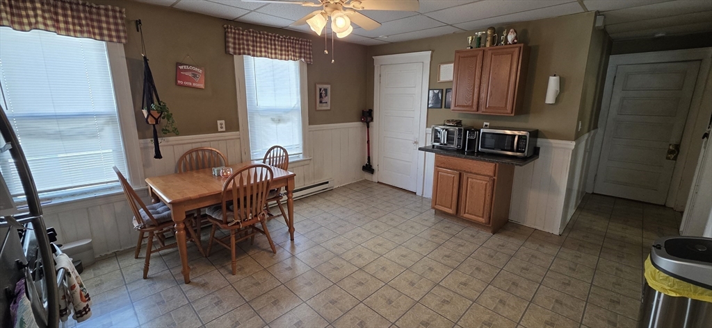 72 Seymour Street, Unit 2 Worcester, MA 01610 - Photo 2 of 18 a dining room with furniture and a window