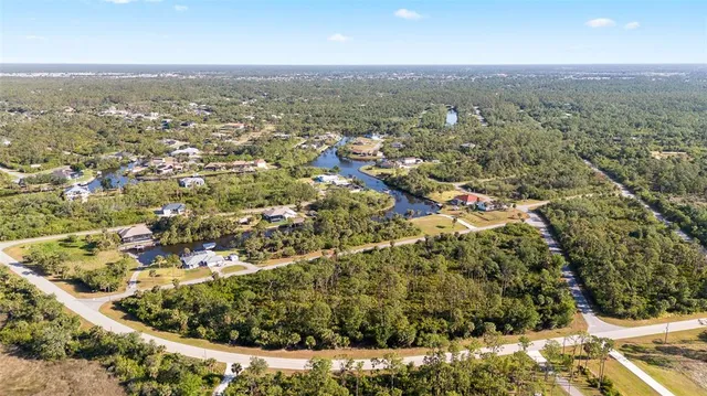 an aerial view of residential houses with city view and city view