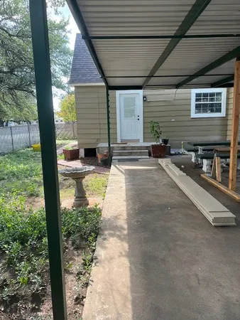 a view of a swimming pool with a sitting area