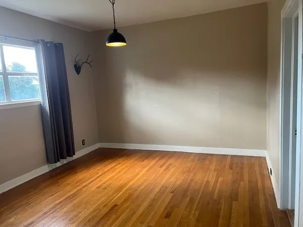 a bathroom with a sink vanity and mirror