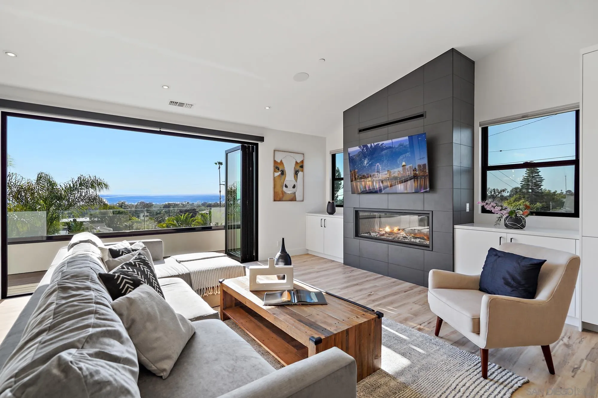 1604 Legaye Drive Cardiff, CA 92007 - Photo 13 of 42 a living room with furniture and a large window