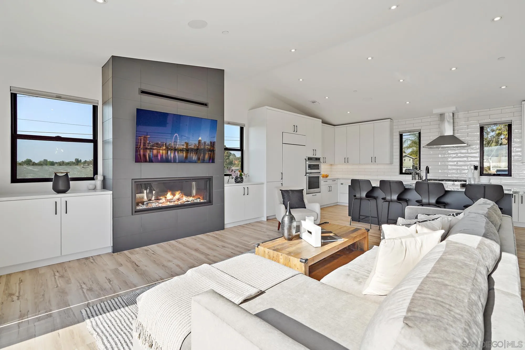 1604 Legaye Drive Cardiff, CA 92007 - Photo 14 of 42 a living room with furniture and a fireplace