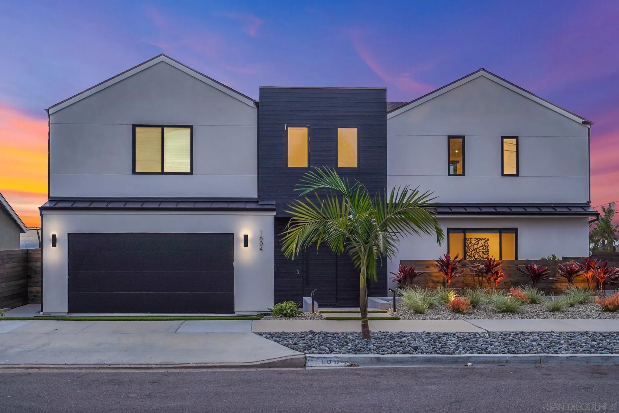 1604 Legaye Drive Cardiff, CA 92007 - Photo 2 of 42 a front view of a house with garage