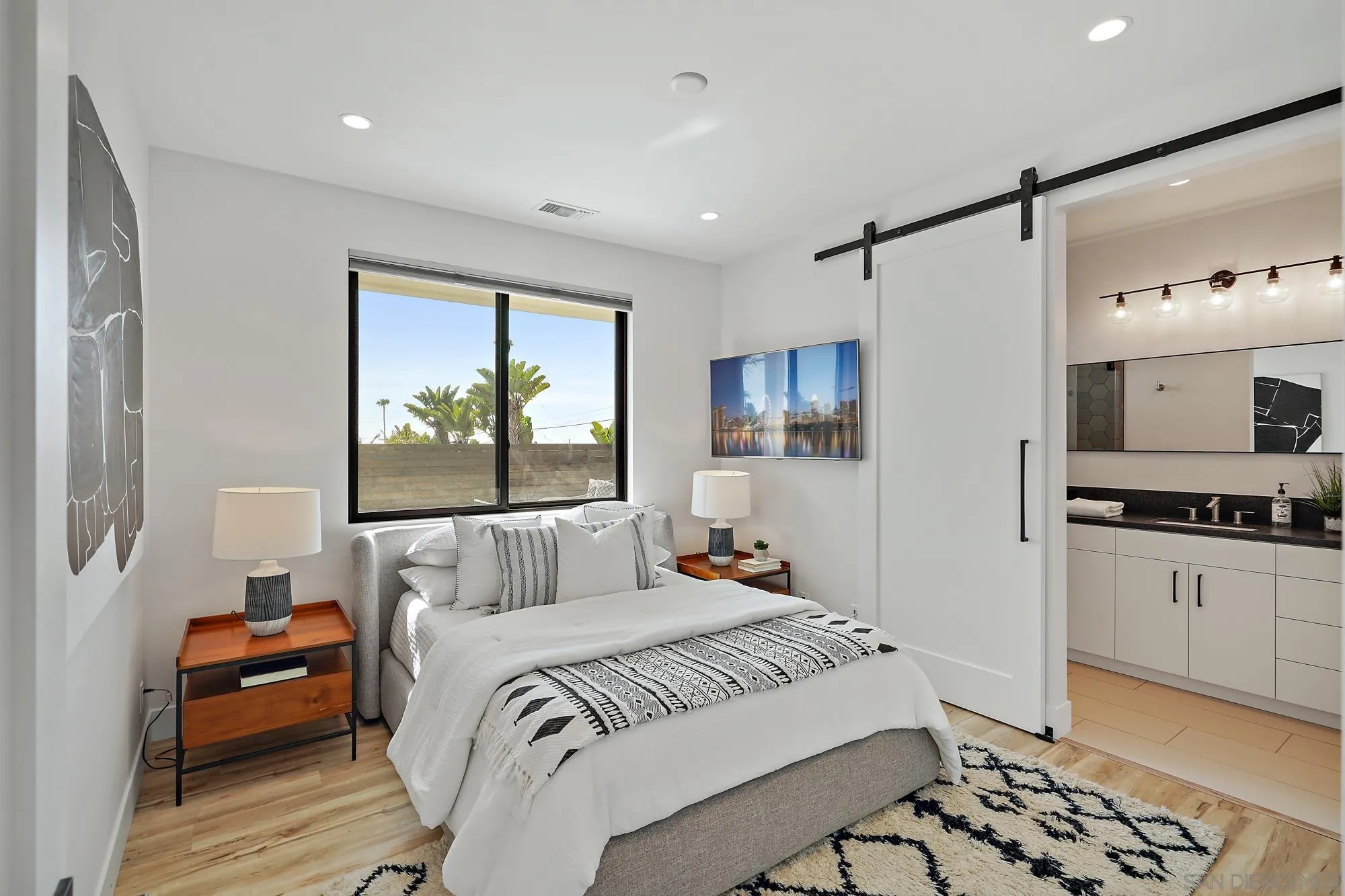 1604 Legaye Drive Cardiff, CA 92007 - Photo 26 of 42 a bedroom with a bed and a window