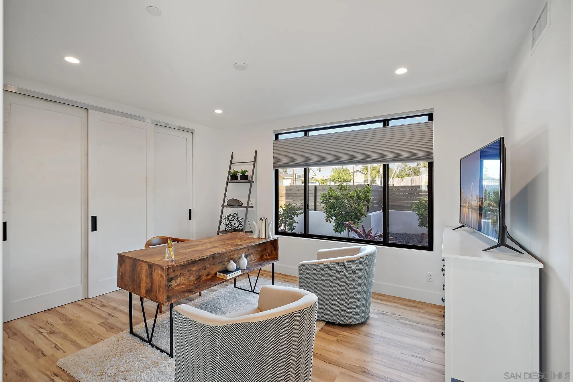 1604 Legaye Drive Cardiff, CA 92007 - Photo 28 of 42 a dining room with furniture and wooden floor