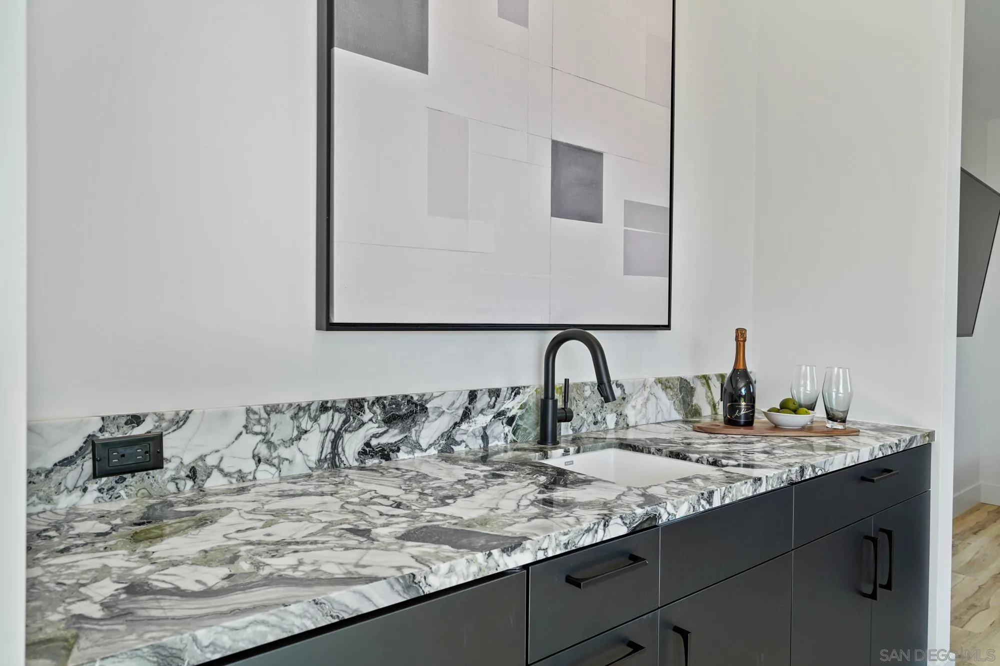 1604 Legaye Drive Cardiff, CA 92007 - Photo 32 of 42 a bathroom with a sink and a mirror