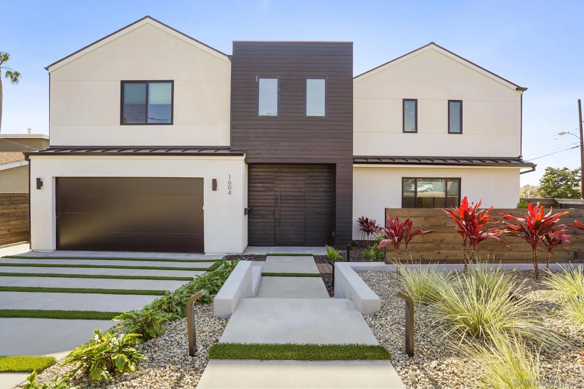 1604 Legaye Drive Cardiff, CA 92007 - Photo 34 of 42 a front view of a house with a yard