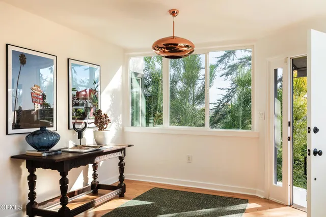 a view of a living room with furniture