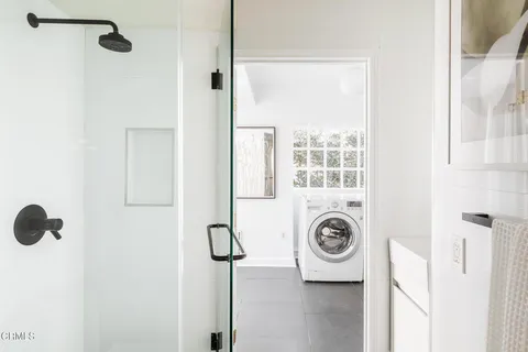 a utility room with dryer and washer