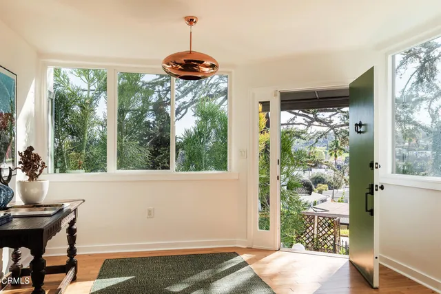 a room with furniture and window