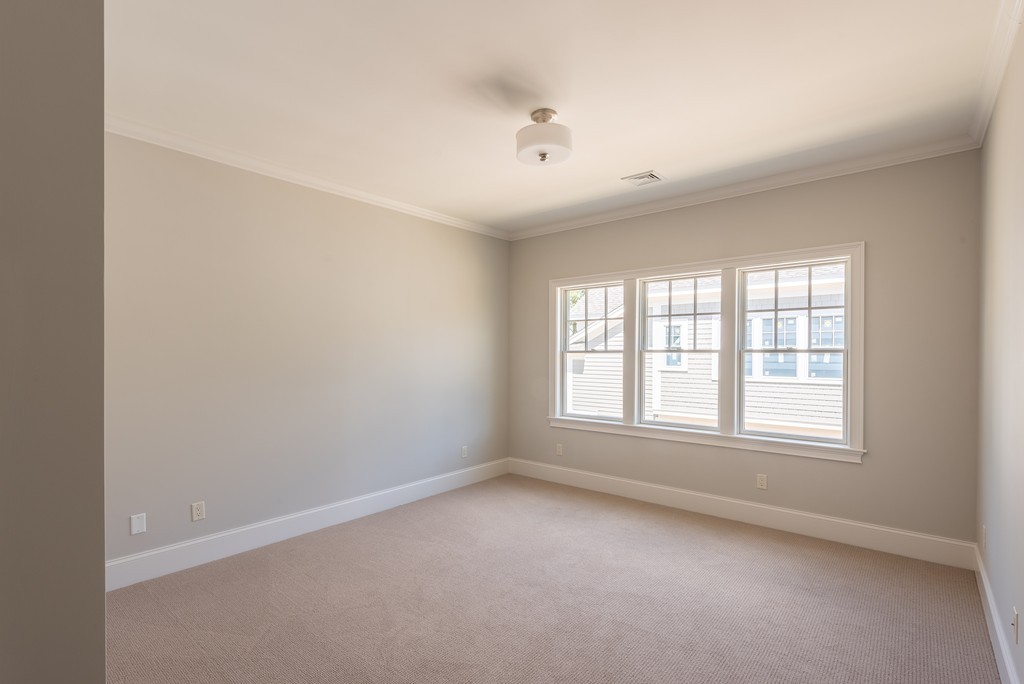 40 Clayton Circle, Unit B Mashpee, MA 02649 - Photo 12 of 12 an empty room with a window
