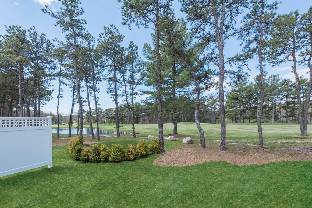 40 Clayton Circle, Unit B Mashpee, MA 02649 - Photo 3 of 12 a view of a park and trees