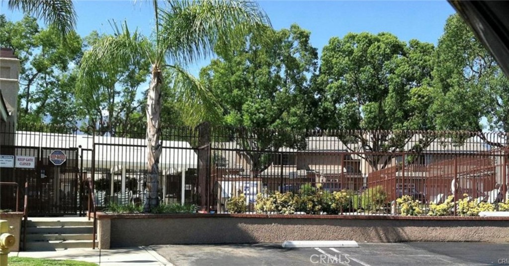 11254 Terra Vista Parkway Rancho Cucamonga, CA 91730 - Photo 17 of 18 a front view of a house with a garden