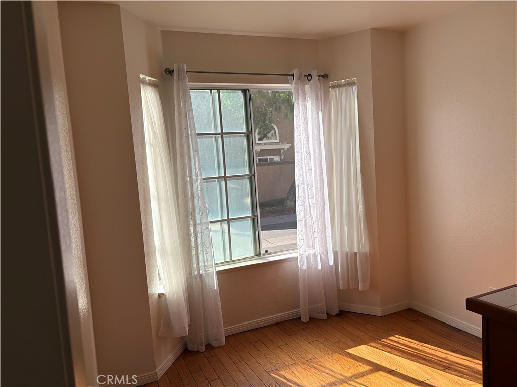 11254 Terra Vista Parkway Rancho Cucamonga, CA 91730 - Photo 2 of 18 a view of an empty room and window