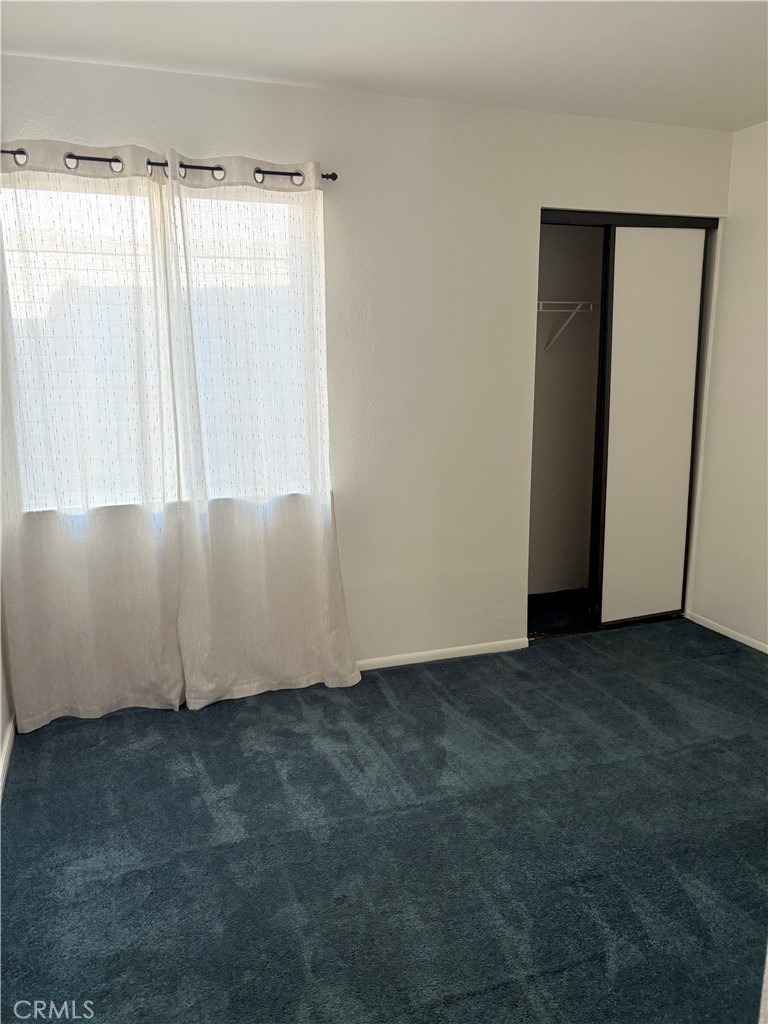 11254 Terra Vista Parkway Rancho Cucamonga, CA 91730 - Photo 7 of 18 an empty room with a window