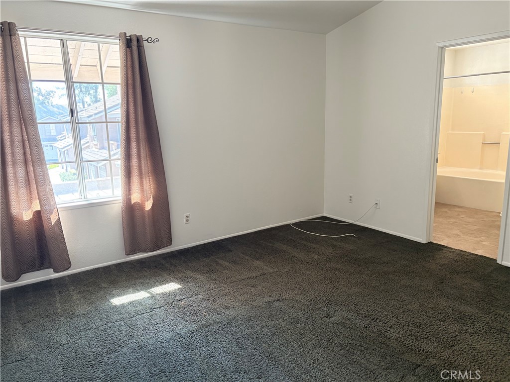 11254 Terra Vista Parkway Rancho Cucamonga, CA 91730 - Photo 9 of 18 an empty room with a window