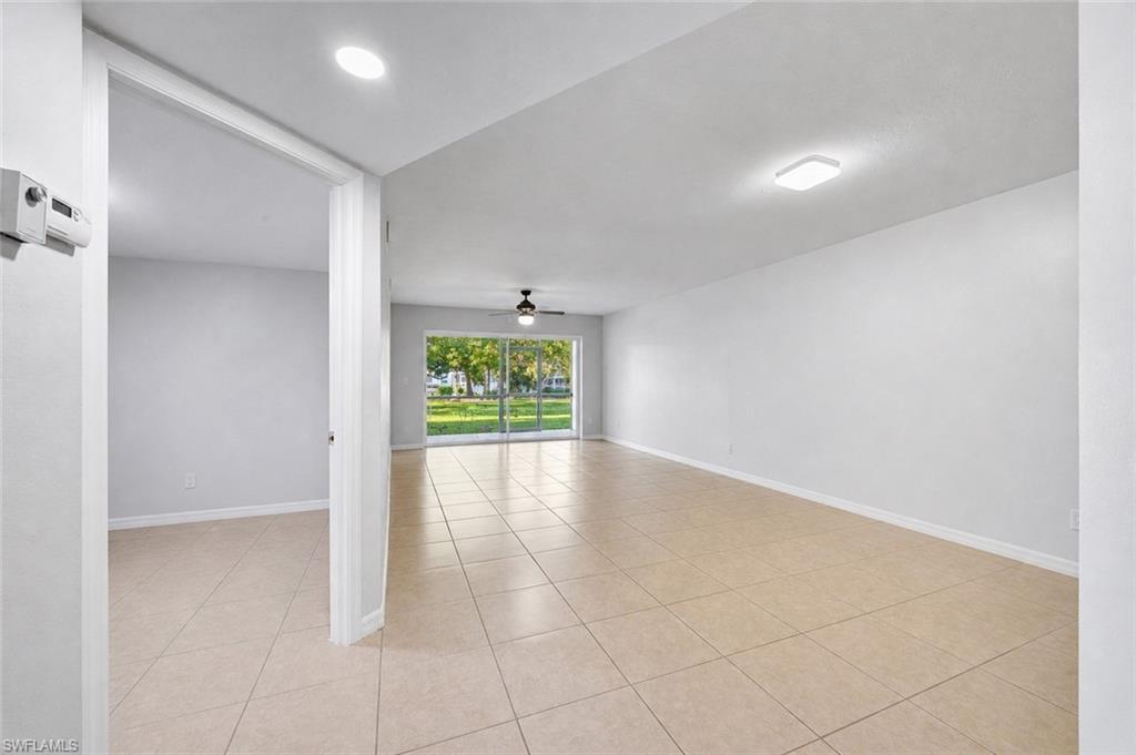 5737 Whitaker Road, Unit C101 Naples, FL 34112 - Photo 10 of 28 a view of an empty room