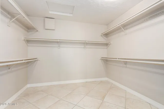 a view of an empty walk in closet