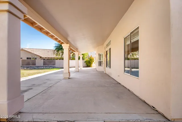a view of an house with backyard porch and livingroom