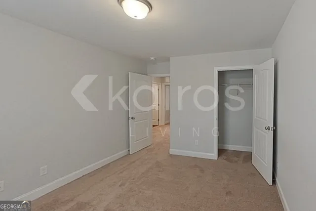 a view of a storage & utility room with a sink