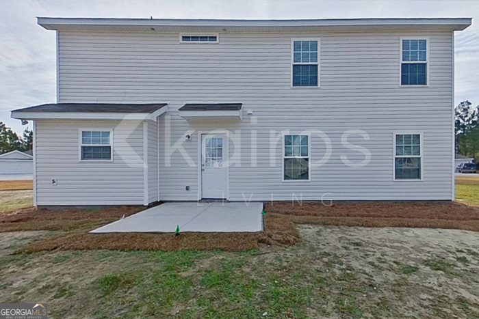 103 Western Red Cedar Drive Springfield, GA 31329 - Photo 21 of 24 a view of house with backyard
