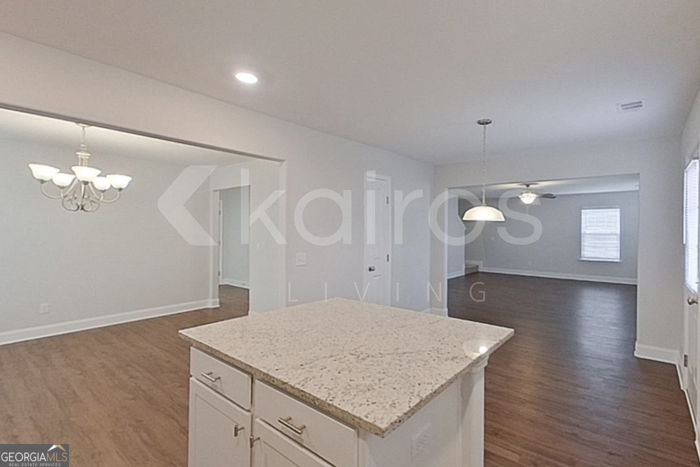 103 Western Red Cedar Drive Springfield, GA 31329 - Photo 8 of 24 a kitchen with a sink cabinets and wooden floor
