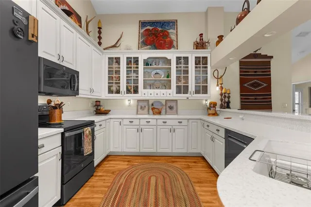 a bedroom with a bed and a table in it