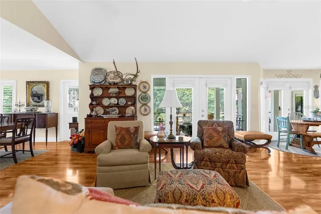 a view of a hall with wooden floor
