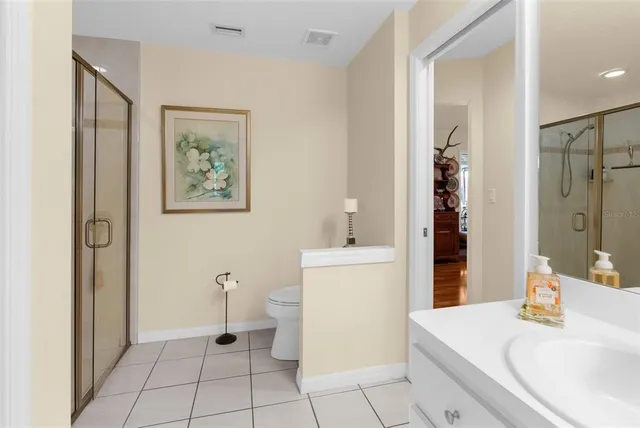 a view of a park with large trees