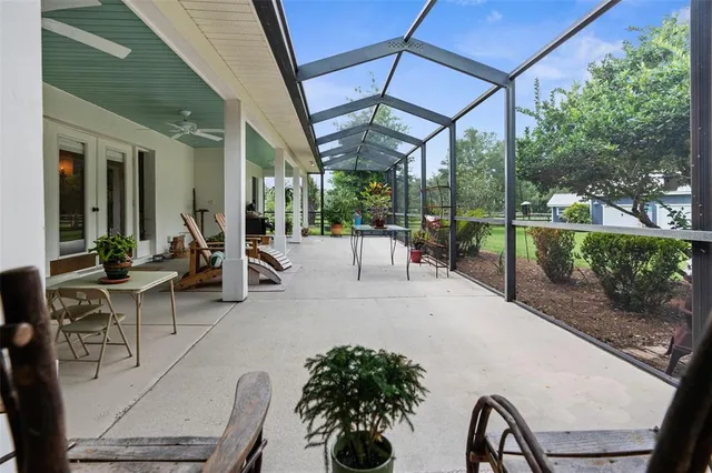 a backyard of a house with seating space