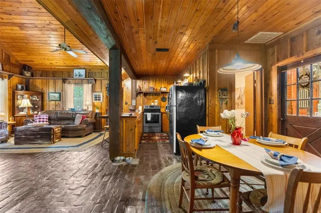 aerial view of a house with a yard