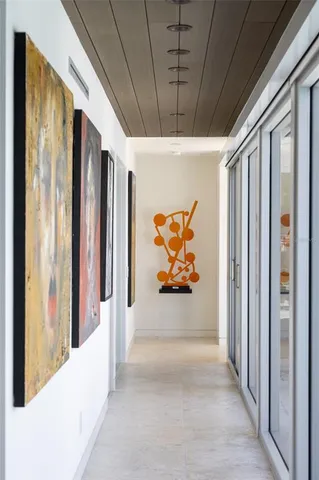 a bathroom with a bathtub sink and mirror