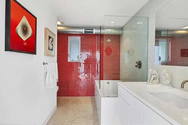 a view of a house with pool and sitting area