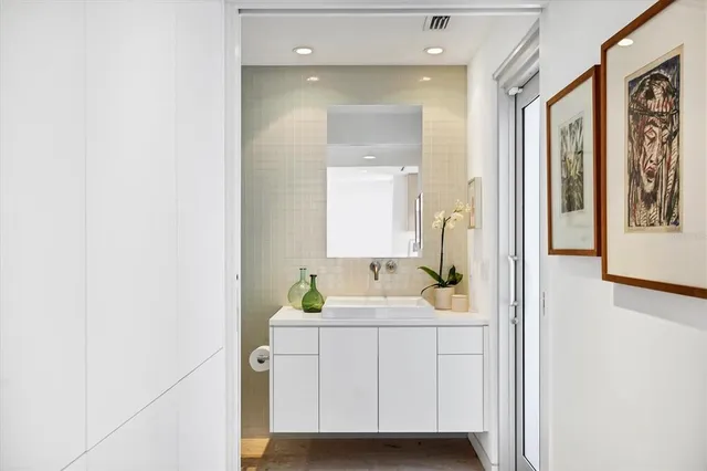 a view of a swimming pool with a yard