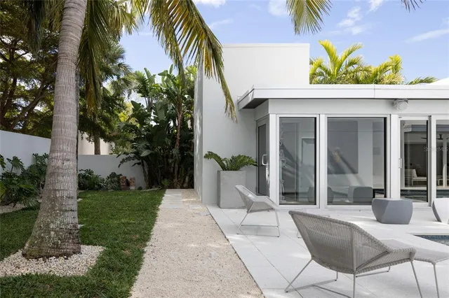 a view of livingroom with furniture and floor to ceiling window