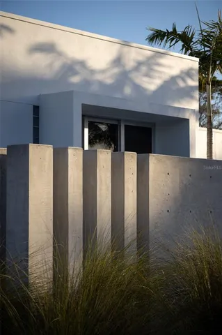 an aerial view of a house with a lake view