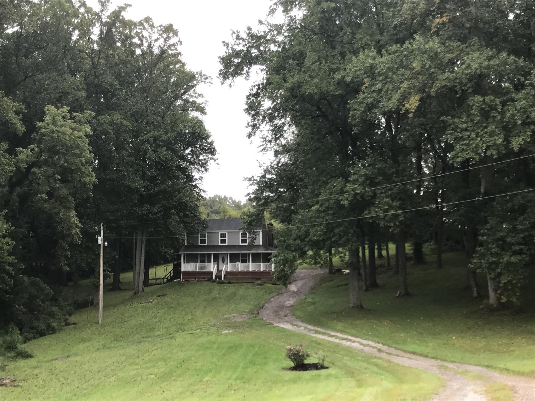8174 New Chapel Road Springfield, TN 37172 - Photo 5 of 14 a view of a house with backyard porch and sitting area