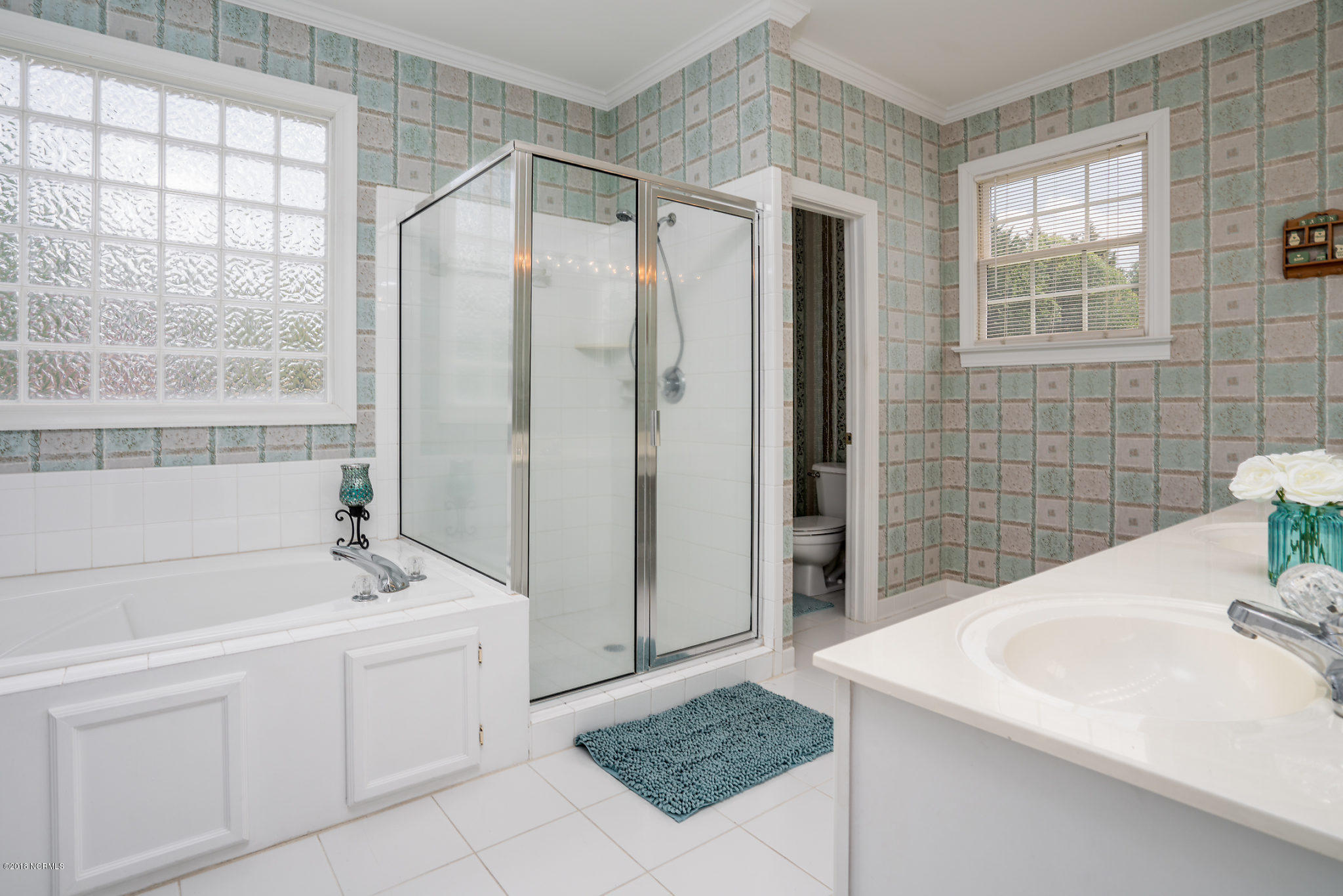 4413 Edgewater Road Elm City, NC 27822 - Photo 9 of 23 MASTER BATH W/DUAL VANITY, WALK-IN SHOWER & WHIRLPOOL TUB!