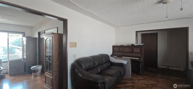 a living room with furniture and a window