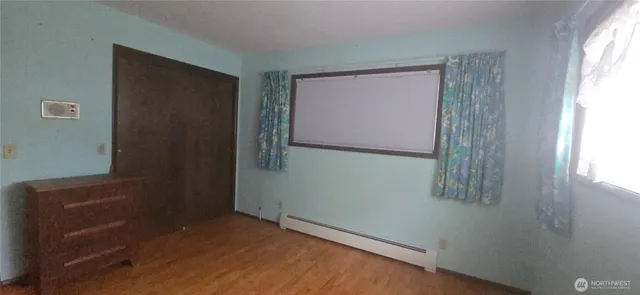 an empty room with windows