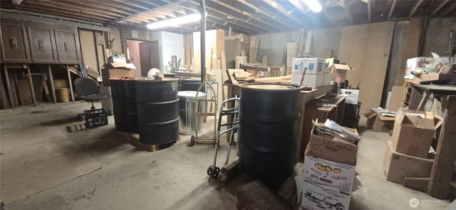 a view of a dining room with many windows