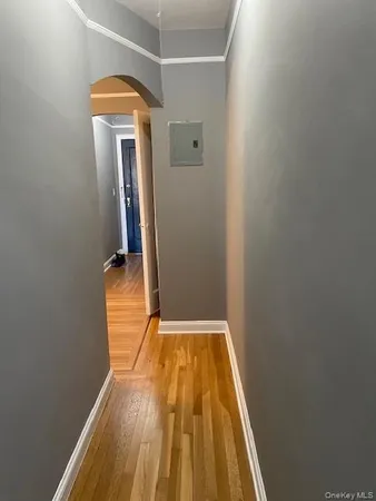 a view of a balcony with wooden floor